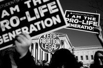 Anti-abortion-rights signs at a protest