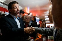 Ron DeSantis greets people at the Red Arrow Diner in Manchester, New Hampshire