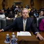 Senator Lindsey Graham sits in a hearing room as he testifies in support of his Obamacare repeal bill.