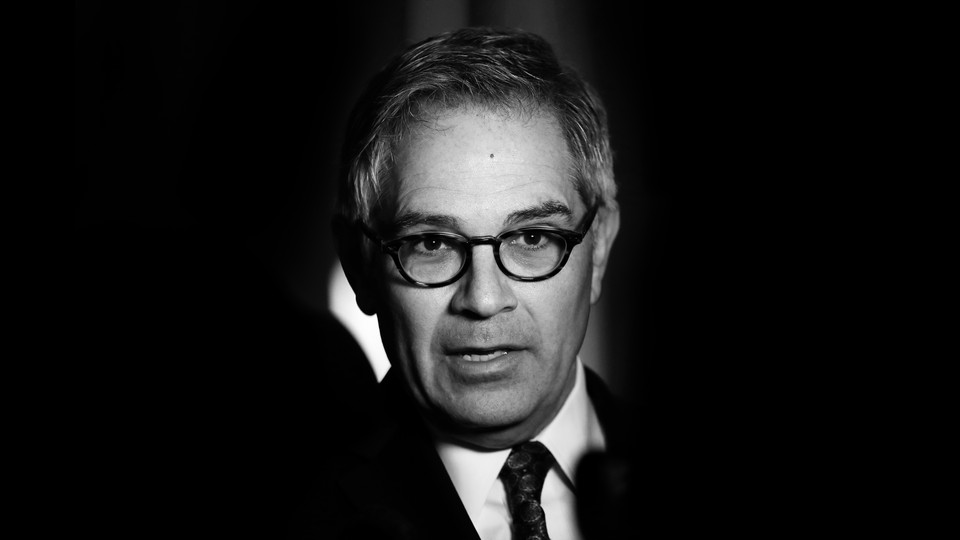 A black-and-white photo of Larry Krasner