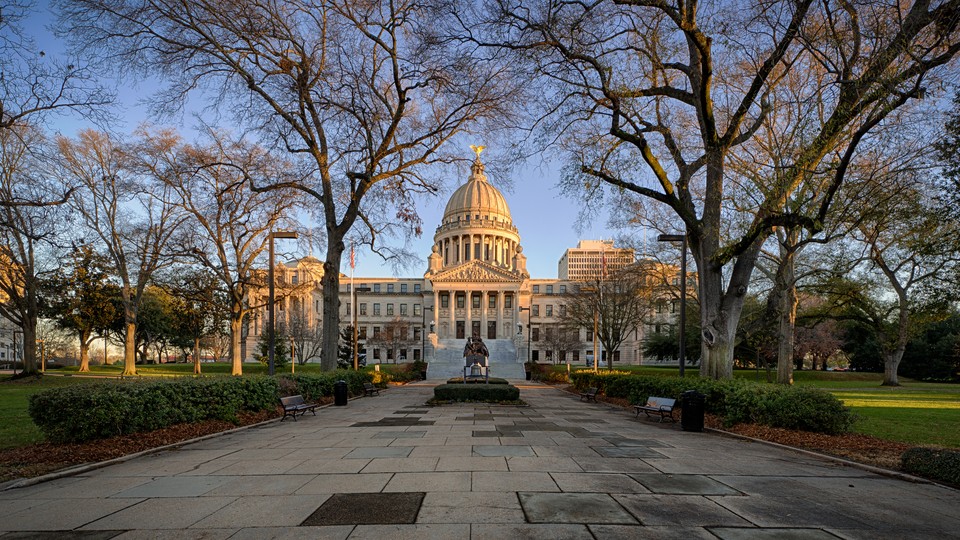 Exterior of the Mississippi state capitol at dawn in Jackson, Mississippi