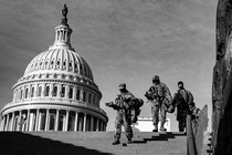 Security personnel near the Capitol dome