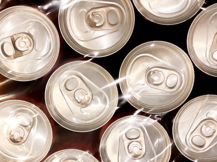 Overhead image of multiple aluminum soda cans