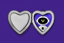 A silver heart-shaped locket is open to reveal the image of a robot inside. The silver locket is set against a deep-purple background.