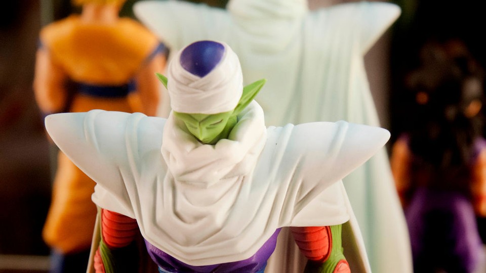 A toy figurine of Piccolo from Dragon Ball Z