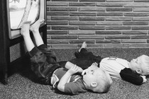 Two boys watching television