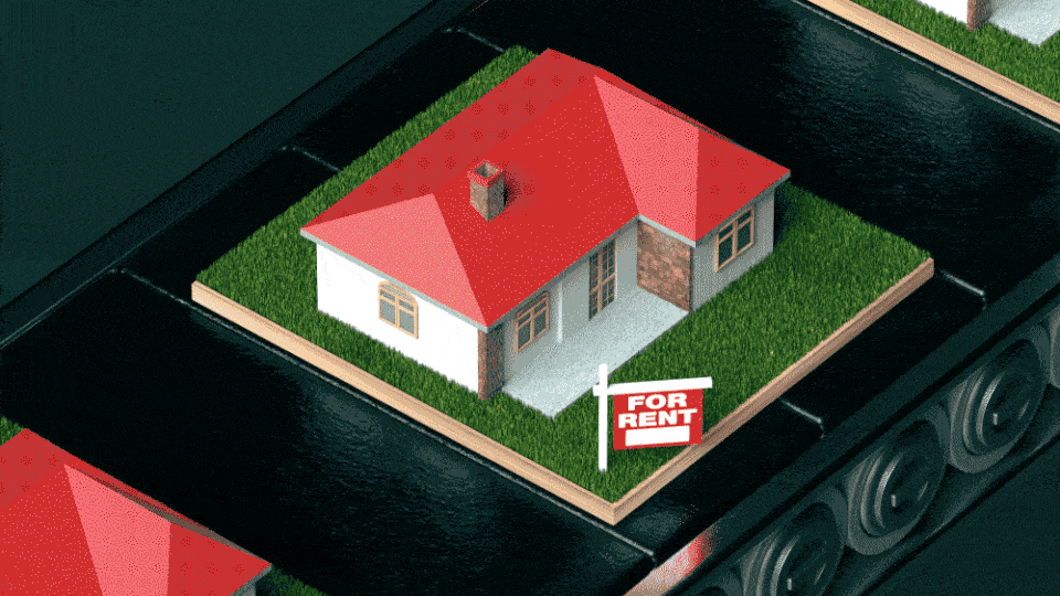 A gif of identical houses moving along a conveyor belt