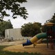 A colorful slide and playground without children