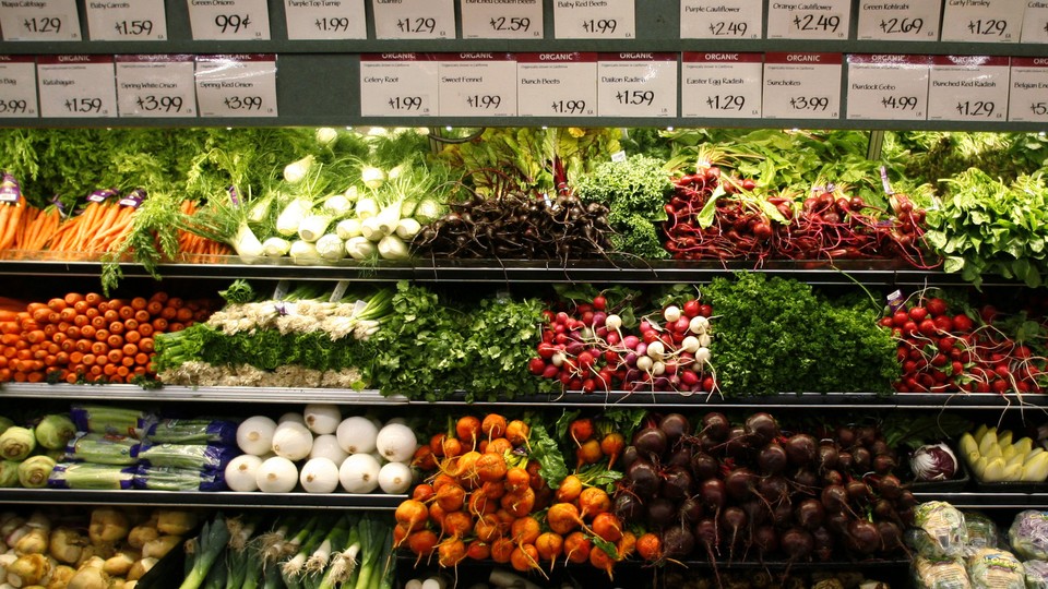 Vegetables on grocery-store produce shelves