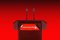 A podium with a sign that says "TrumpsProject2025"