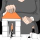 one person in a building block house, while another sits out, and the house is being built by a woman