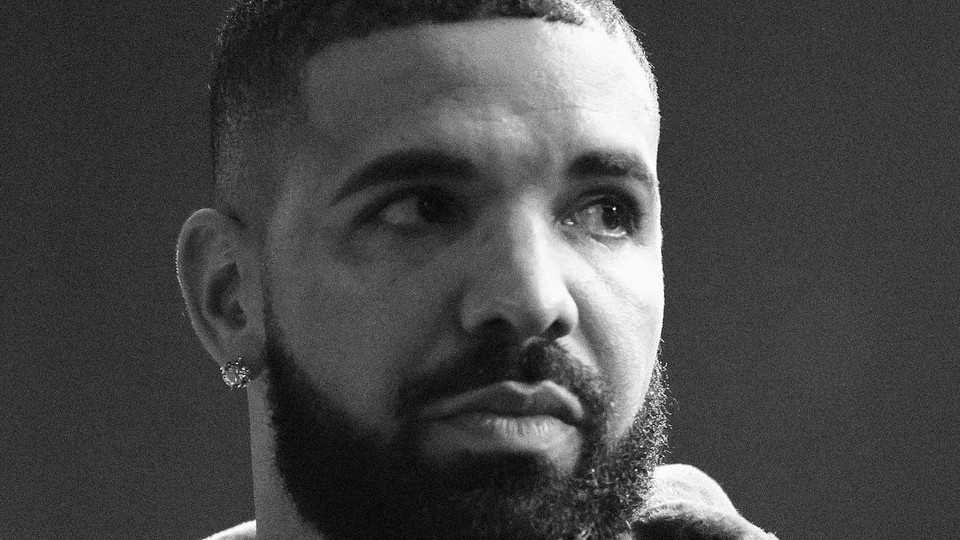 Close-up black and white photo of Drake