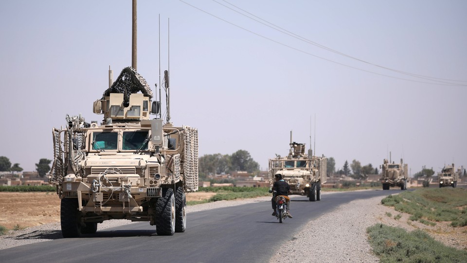 A U.S. military convoy in Raqqa, Syria