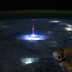 A nighttime view of the Earth, from orbit, with a bright blue-and-red bolt of electrical energy shooting up from a lightning strike in a storm below.