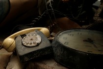 A rotary telephone and clock are seen in the NATO tunnels dating back to the Cold Warbeneath Valletta, Malta, in 2017.