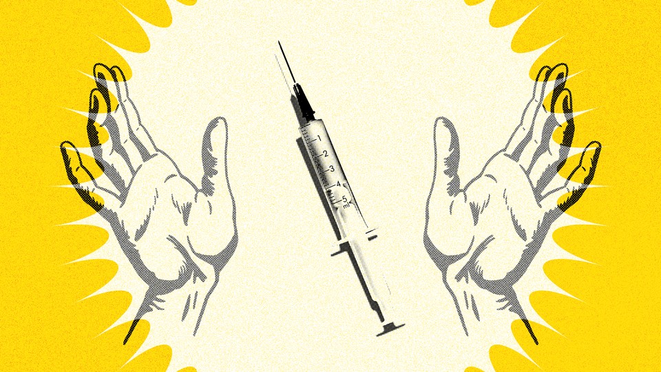 two hands frame a syringe in a burst of yellow light