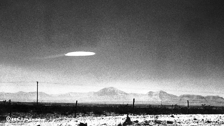 A photo of a UFO-shaped object in the sky