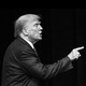 A black and white image of Donald Trump pointing