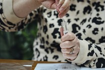 a woman uses a coronavirus test