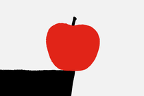 An apple sitting at the edge of a desk, dangerously close to falling