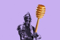 a knight holding a honey stick