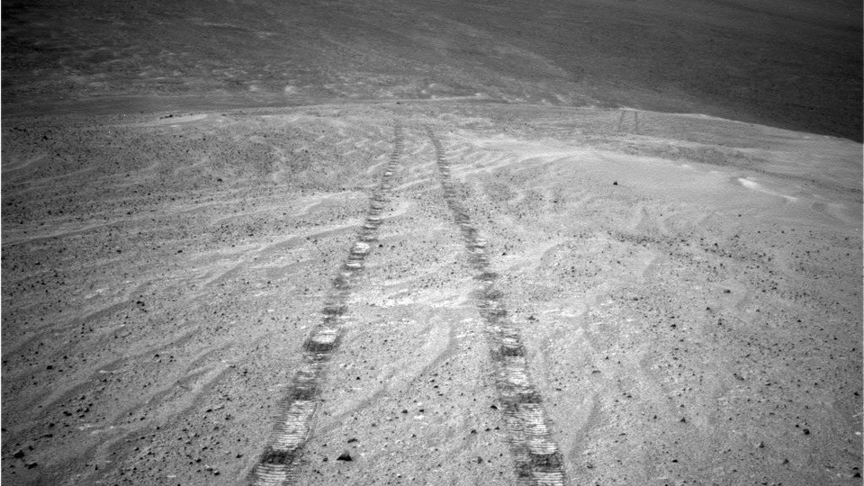 The Opportunity rover looks back on its tracks on Mars.