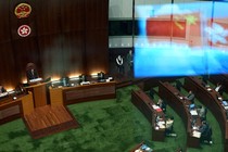 Hong Kong Chief Executive John Lee answers questions about Article 23 at the Legislative Council on January 25.