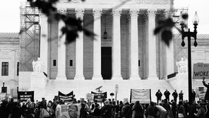 A photo of protesters outside the Supreme Court