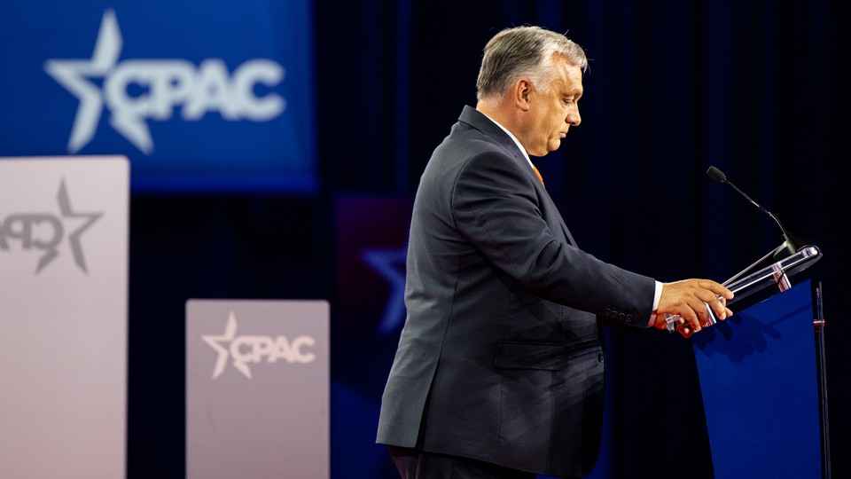 Hungarian Prime Minister Viktor Orbán in front of a podium at CPAC