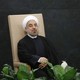 Iranian President Hassan Rouhani sits before addressing the 2013 UN General Assembly