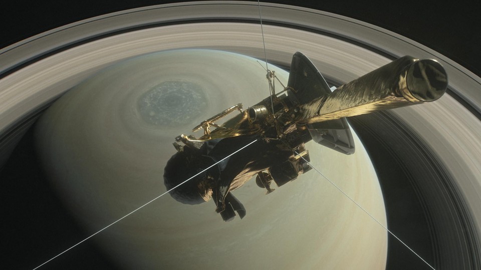 An illustration of Cassini above Saturn's northern hemisphere during its final orbits