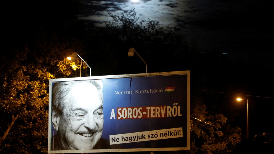 A billboard in Budapest, Hungary, with an image of the philanthropist George Soros on it.