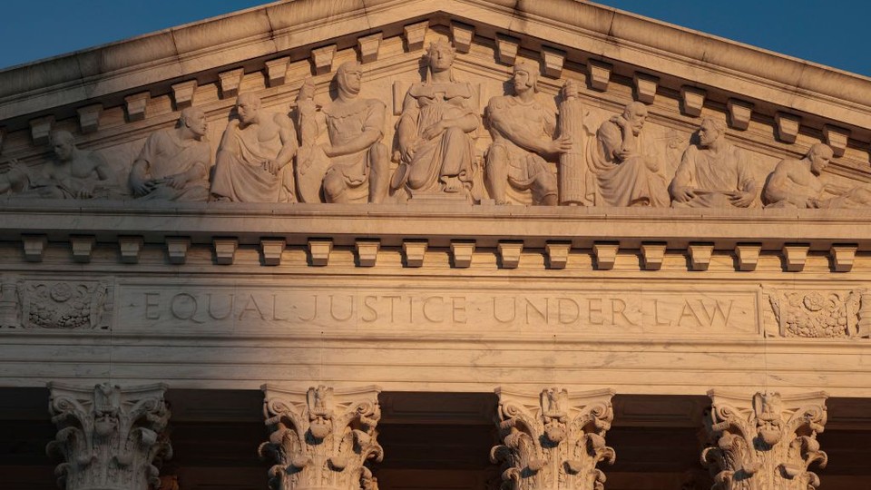 The United States Supreme Court building, close up on the inscription, equal justice under law