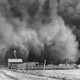 A ranch in Boise City, Oklahoma, is about to be encompassed by a gulf cloud in April 1935.
