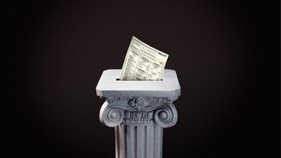 A ballot being cast in a marble pillar