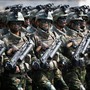 North Korean special forces soldiers march and shout slogans during a military parade marking the 105th birth anniversary of country's founding father, Kim Il Sung in Pyongyang, North Korea, on April 15, 2017.
