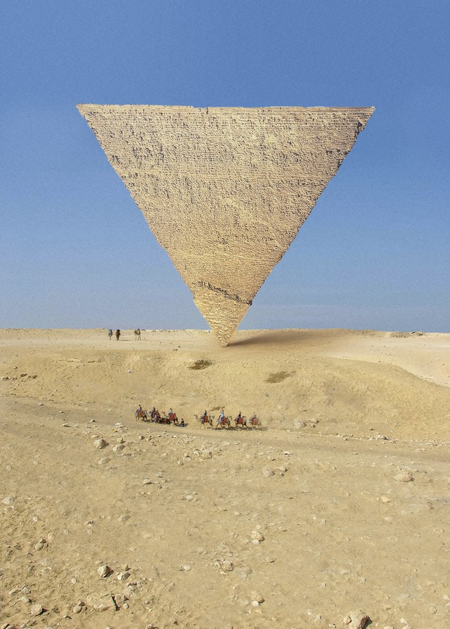 A pyramid balances on its point, upside down, in the desert with blue sky and small figures including a caravan of camels