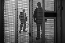 A view of prison employees from inside a cell in the Secured Housing Unit at Pelican Bay State Prison in Crescent City, California, in February 2012