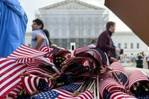 Photo of American flags in front of the Supreme Court