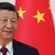 A photograph of Chinese leader Xi Jinping and U.S. President Joe Biden in front of a Chinese flag