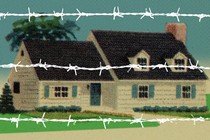 A house behind white barbed wire.