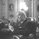 photo: Daniel Patrick Moynihan seated in a chair
