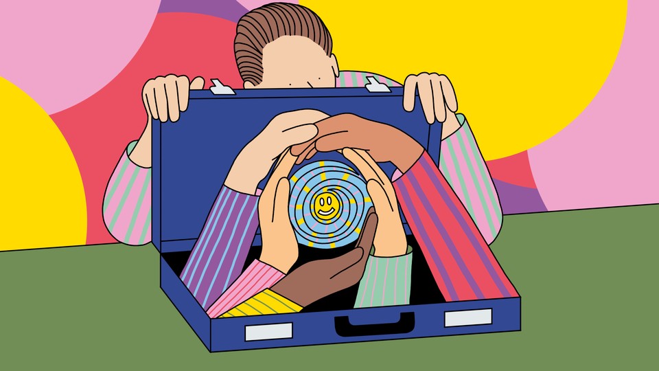 A man opening a briefcase atop a table with hands reaching out from within it to encircle a smiley face