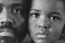 Self-portrait of Rashod Taylor and his son LJ