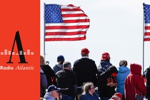 Crowd and American flags at a Trump rally