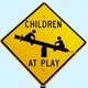 An illustration of a "Children at Play" sign