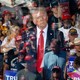 Photograph of Donald Trump looking at his supporters at a rally