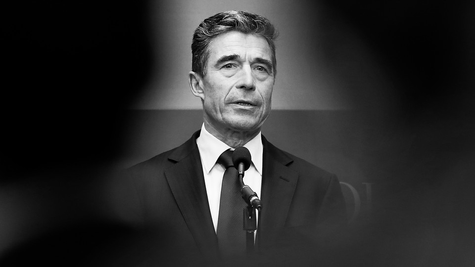 A black-and-white photo portrait of Anders Fogh Rasmussen