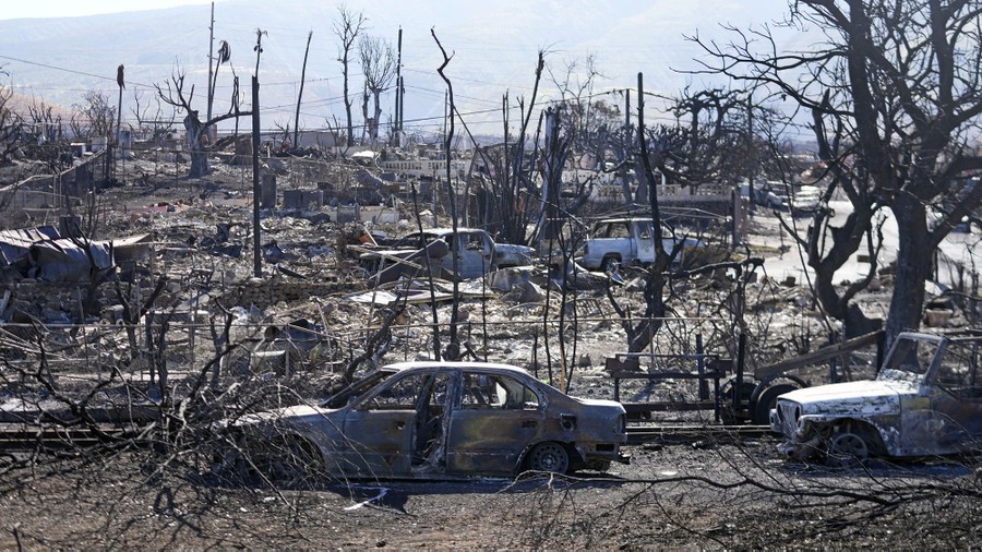 Fire-destroyed homes and cars.