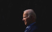 Photo of Joe Biden in silhouette against a black background